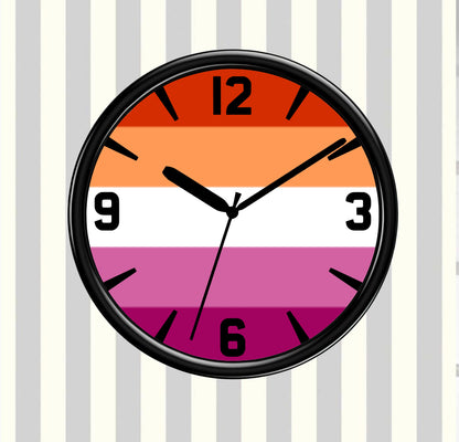 Round clock with a colorful design on a striped background