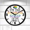 Wall clock with rainbow sheep design and text on a white brick wall background