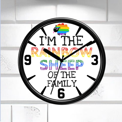 Wall clock with rainbow sheep design and text on a white brick wall background