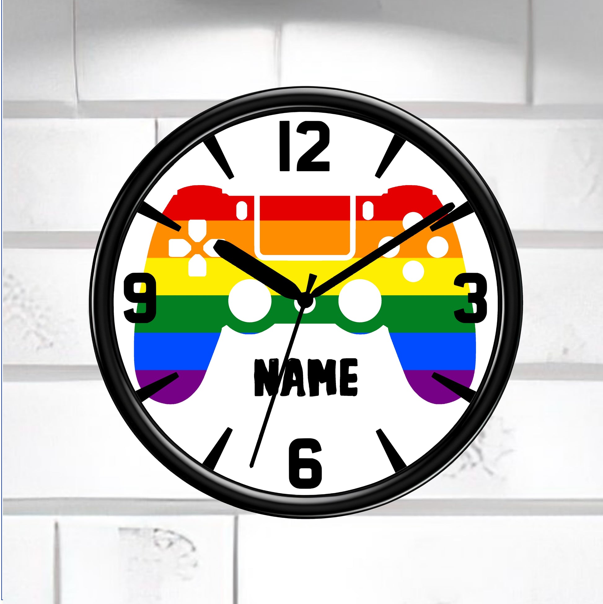 Wall clock with rainbow design and 'NAME' text on a white brick wall background