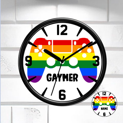Wall clock with rainbow design and 'GAMER' text on a white brick wall background