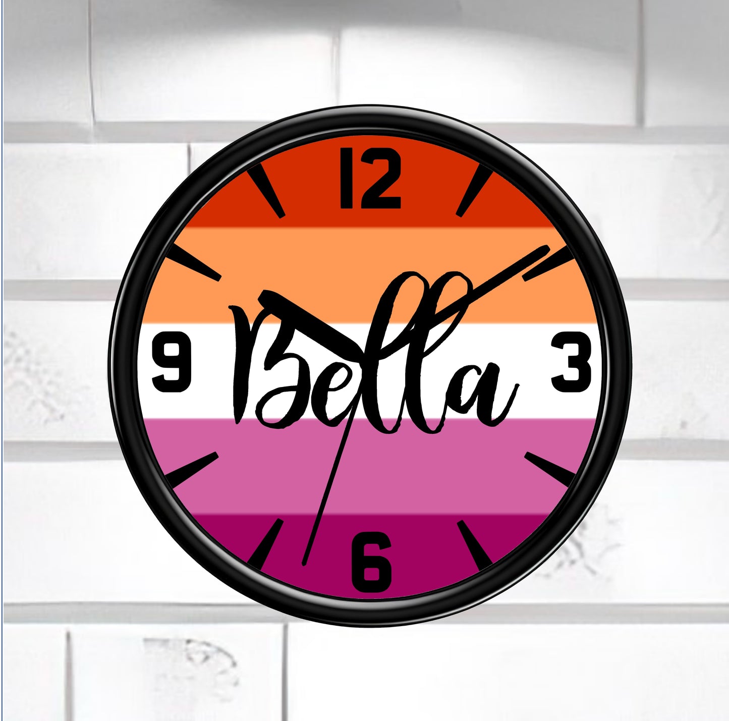 Wall clock with colorful lesbian gradient face and 'Bella' branding