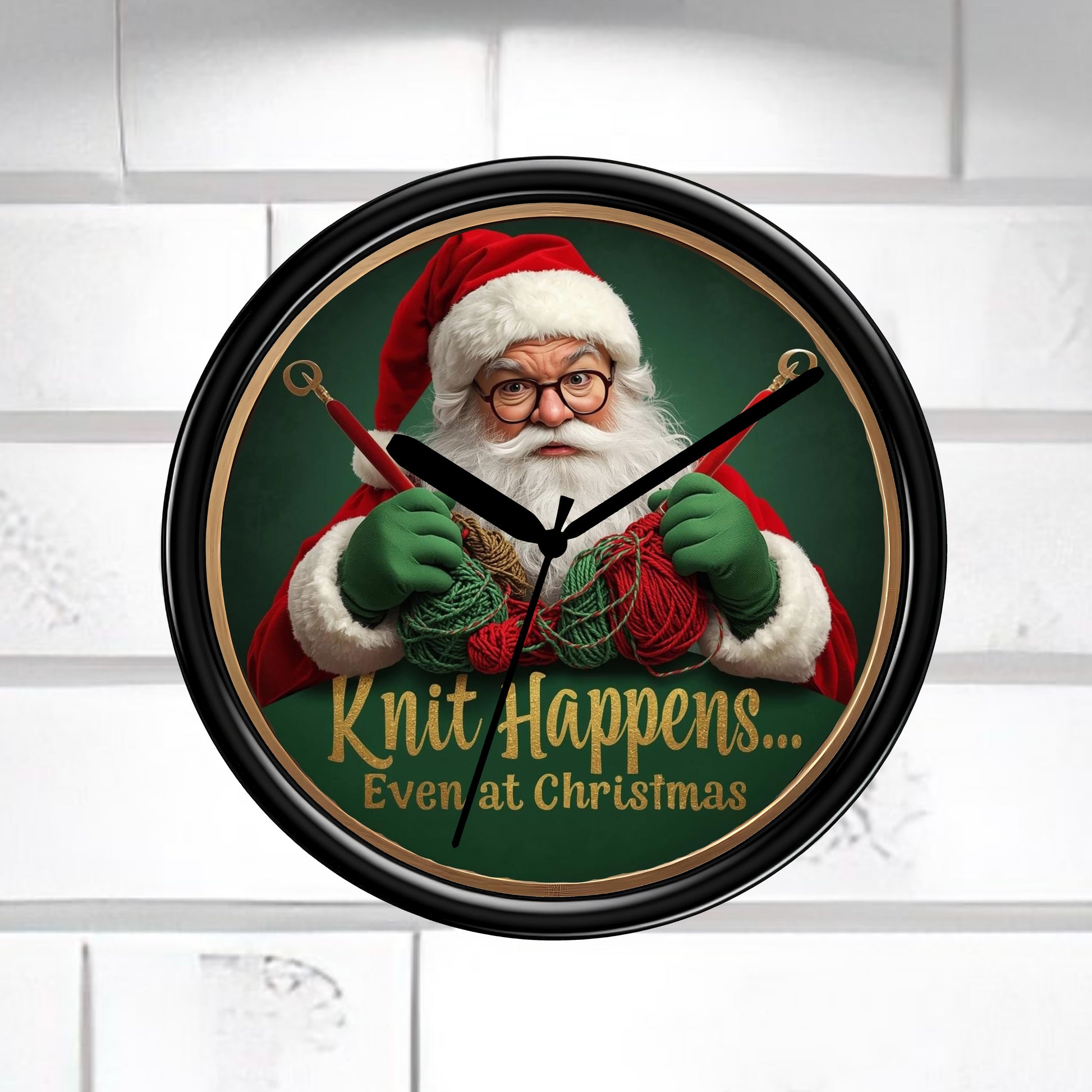 Wall clock with Santa Claus holding knitting materials and text 'Knit Happens... Even at Christmas' on a white background.