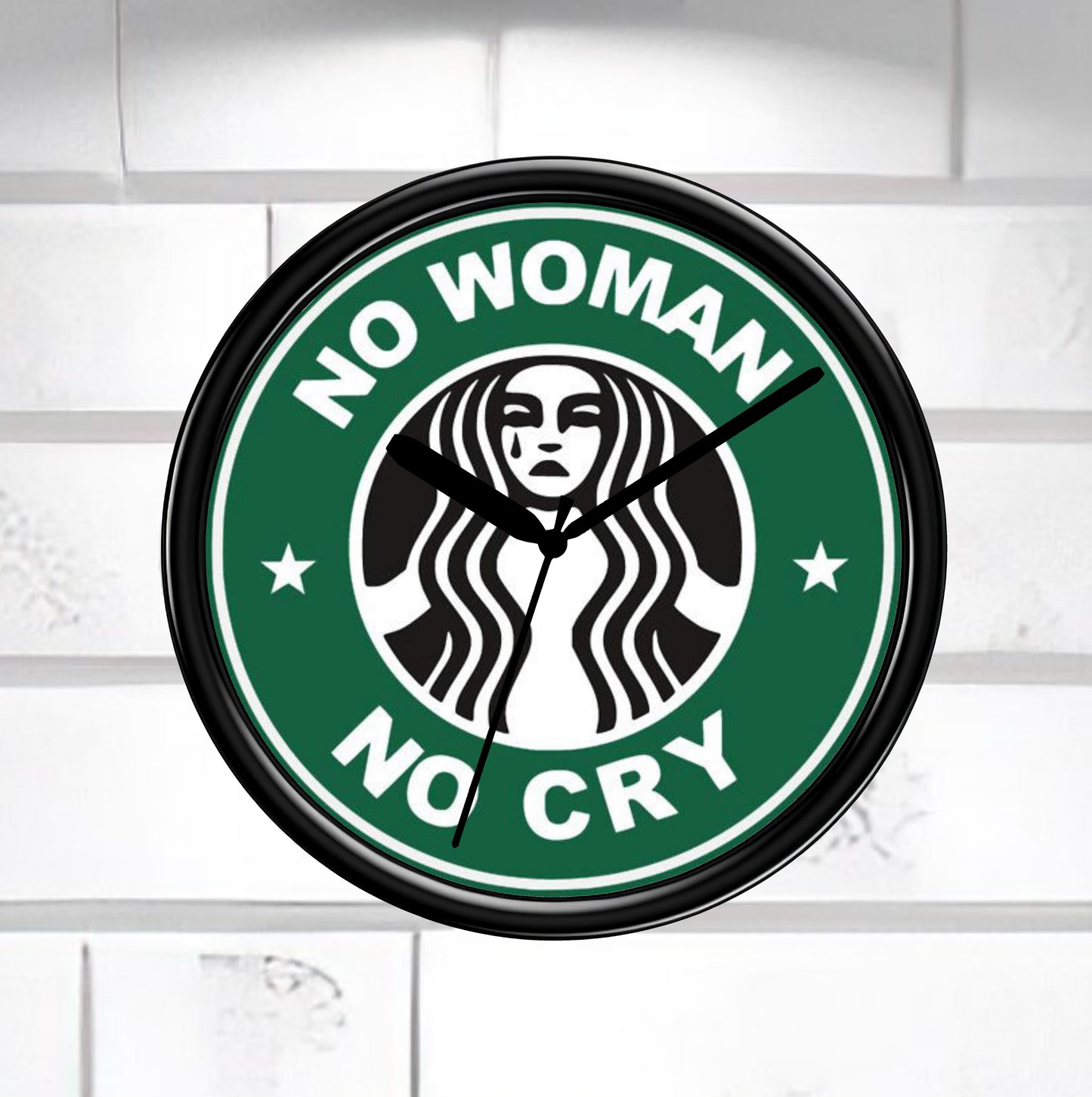 Wall clock with 'No Woman No Cry' design on a white background