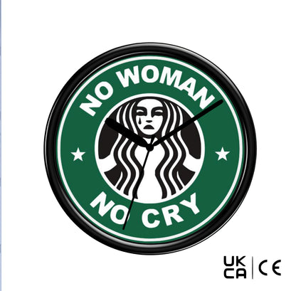 Wall clock with 'No Woman No Cry' text and a logo resembling Starbucks on a green background.