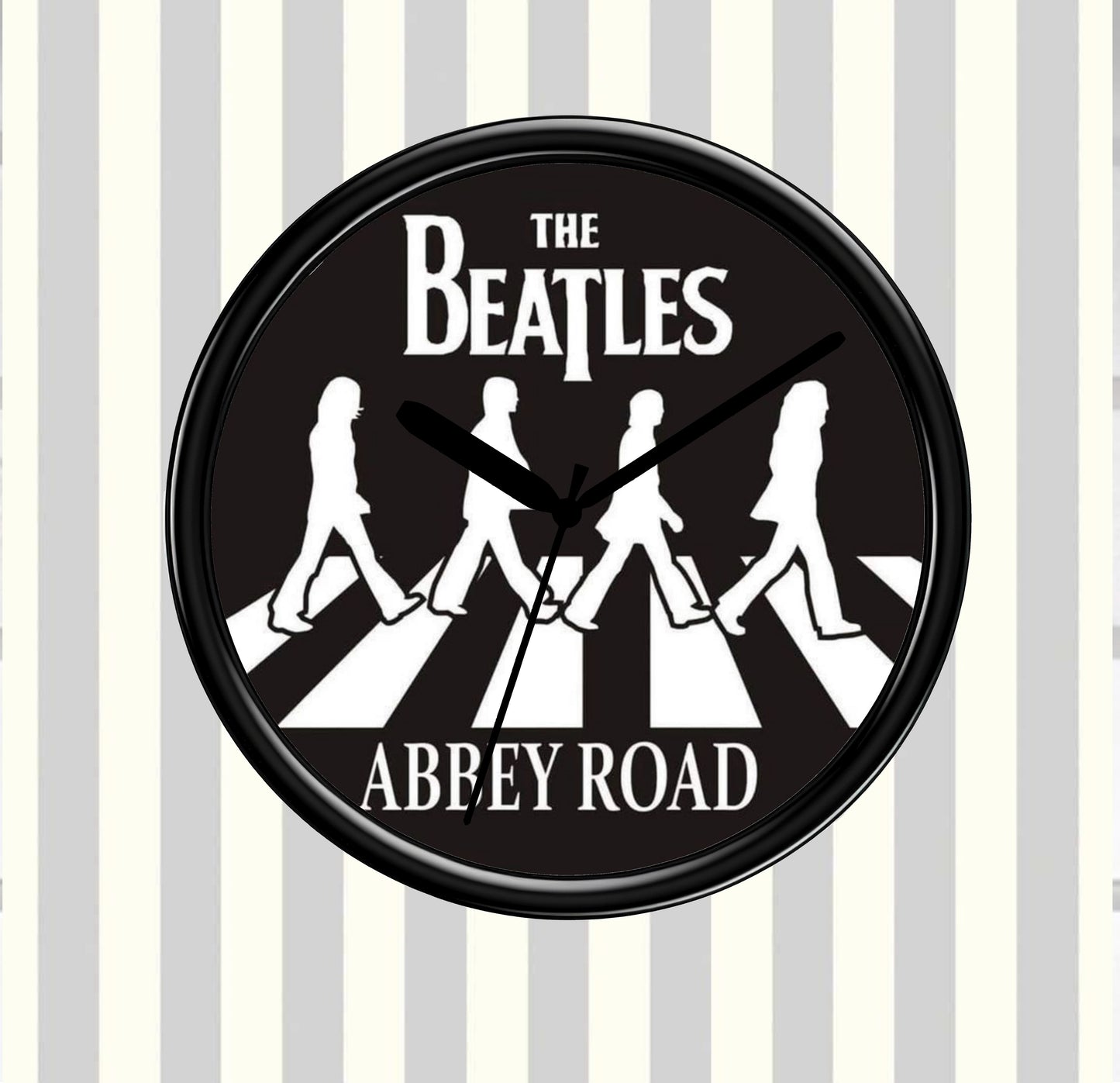 Circular clock with The Beatles Abbey Road design on a striped background