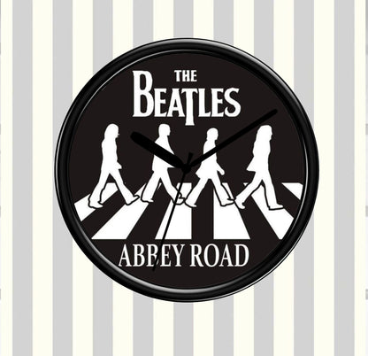 Circular clock with The Beatles Abbey Road design on a striped background