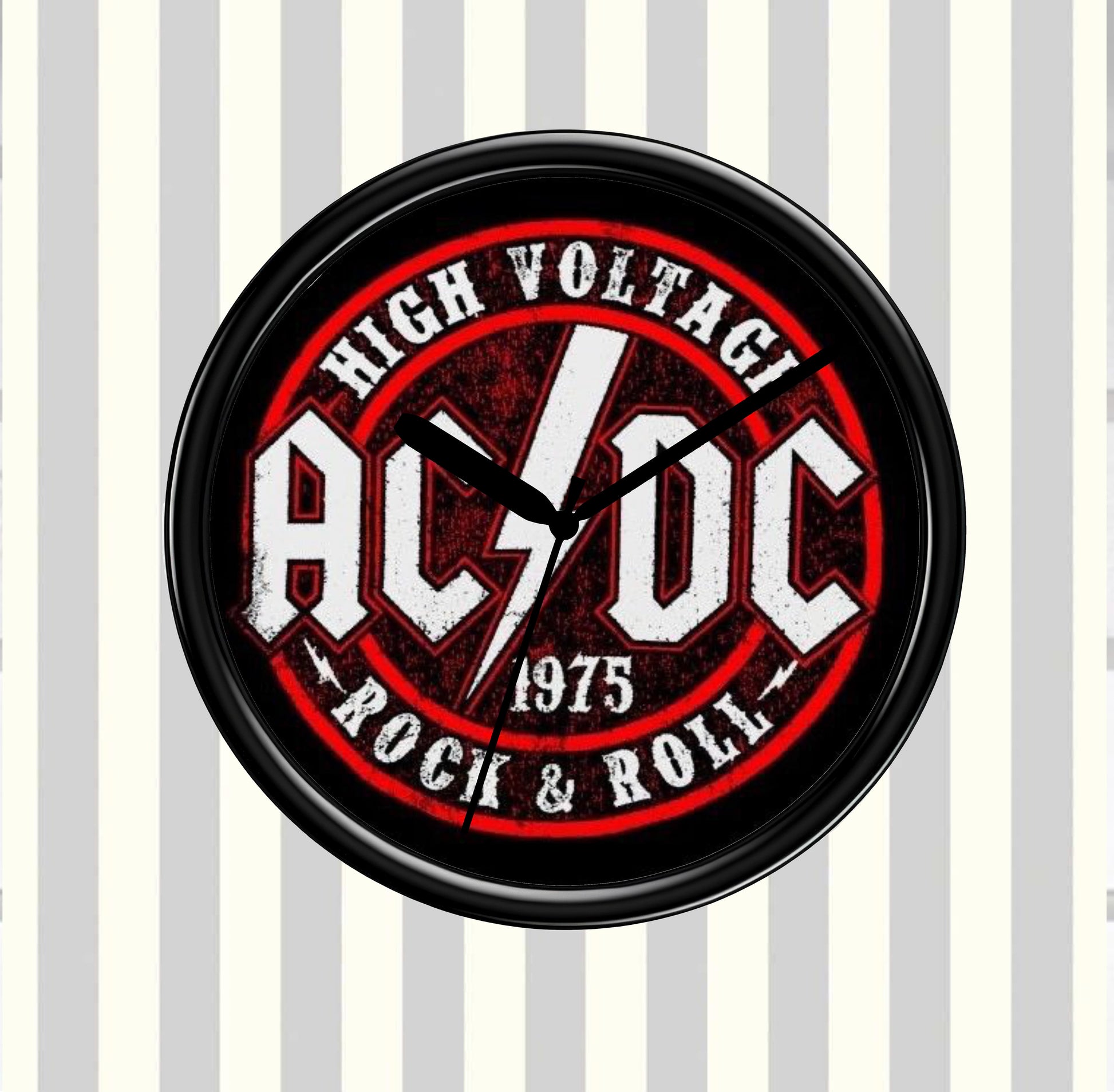 AC/DC clock with 'High Voltage Rock & Roll' design on a striped background