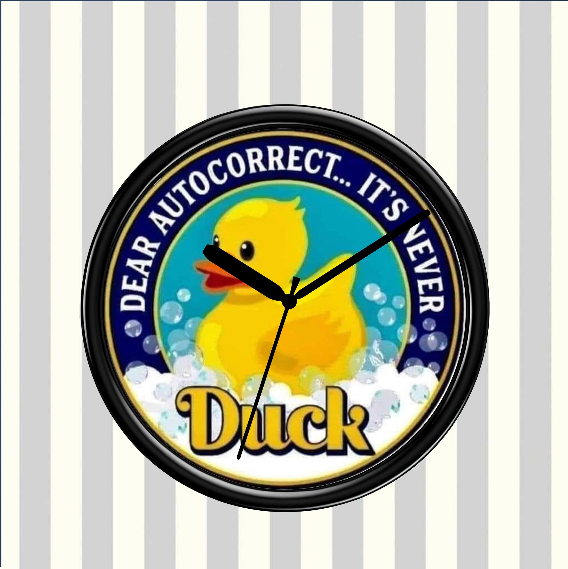 Round clock with a yellow duck illustration and humorous text on a striped background