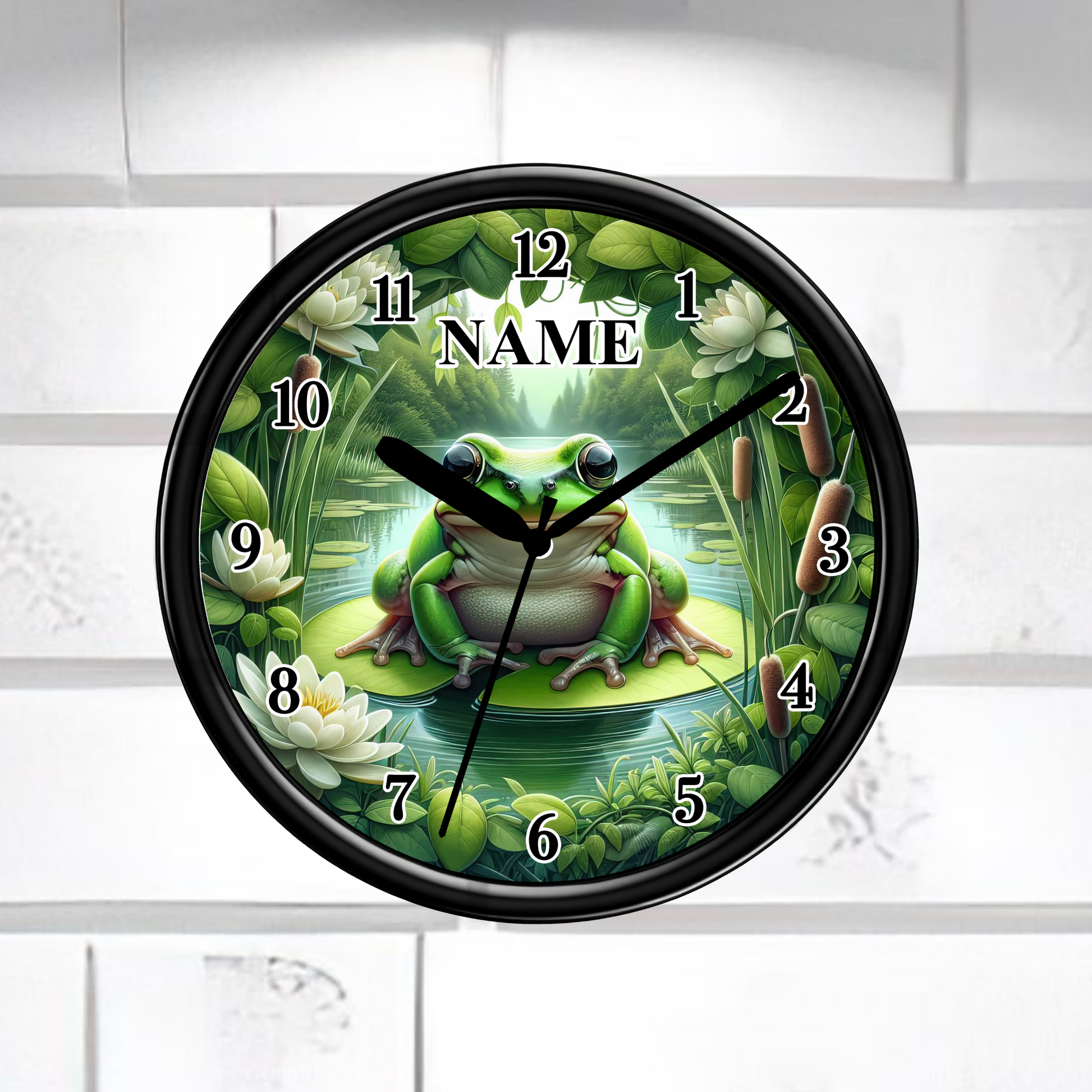 Wall clock with a frog design on a white tiled wall