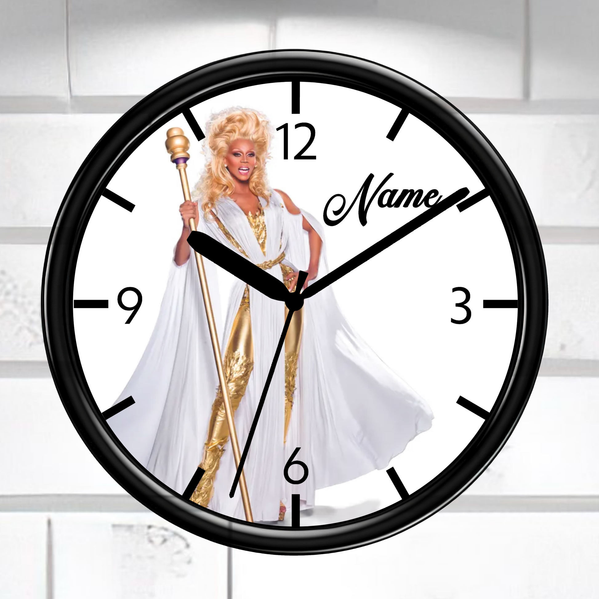 Wall clock with a person in a white robe and gold accents on the face, with 'Name' text.