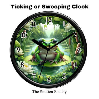 Clock with a frog design on a green background, featuring the brand 'The Smitten Society'.
