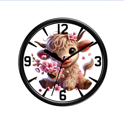 Highland Cow Wall clock, Front view of Black Plastic Clock On A Solid White Background