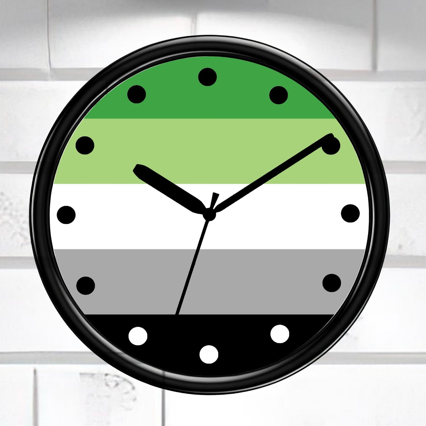 Wall clock with green, gray, and white color pattern on a white brick wall background