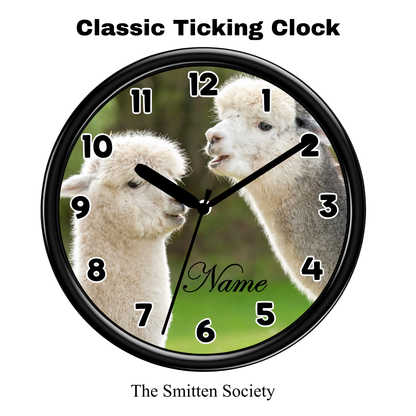 Wall clock with two alpacas on a green background, featuring the brand 'The Smitten Society'.