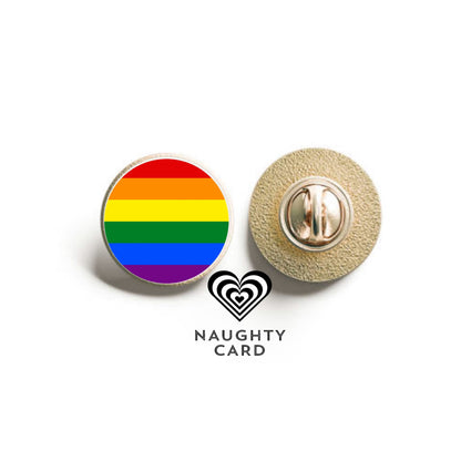 Rainbow flag pin and gold metal pin with 'Naughty Card' branding on a white background
