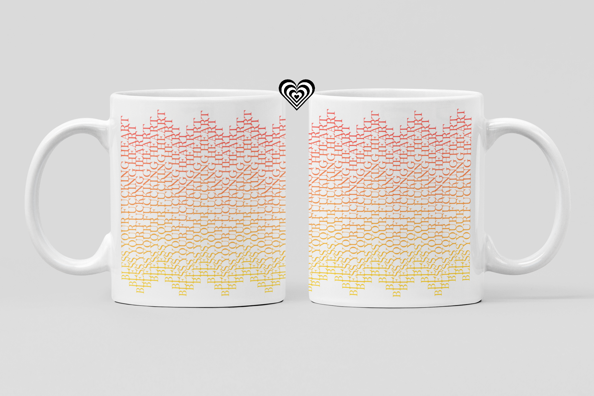 Two white mugs with colorful geometric pattern on a light gray background