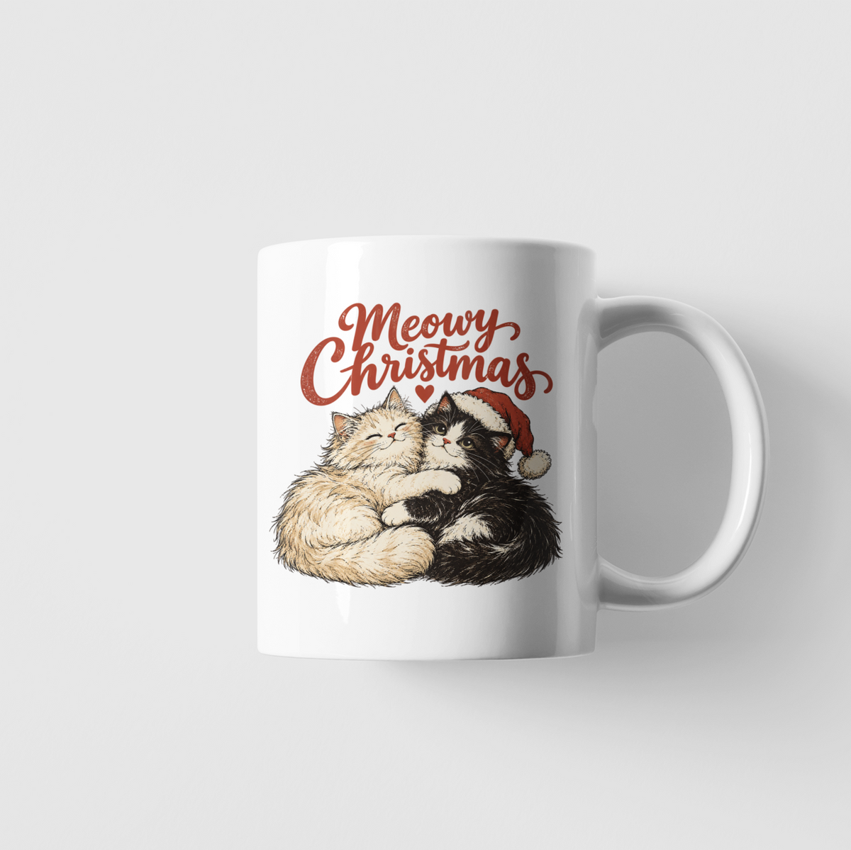 A white ceramic mug featuring a 'Meowy Christmas' graphic with two sleeping cats wearing Santa hats, set against a light gray background.