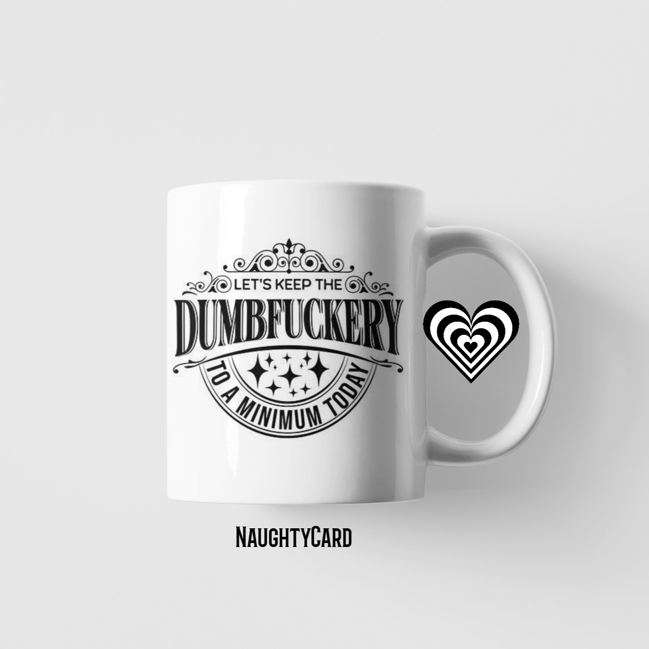 White mug with black "dumbfuckery" text and design on a white background