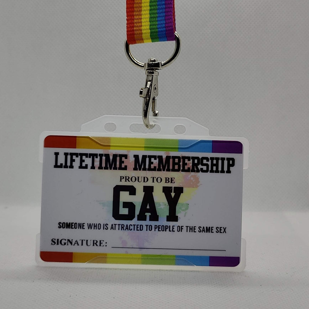 A Metal Gay Membership card with a rainbow-colored border and a personalized message that reads 'Lifetime Membership PROUD TO BE GAY' along with a signature line.
