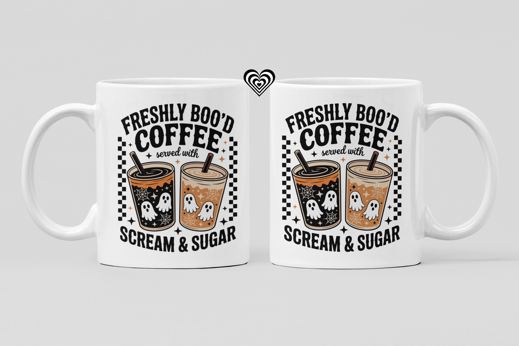 Two white mugs with Halloween-themed coffee design on a light gray background