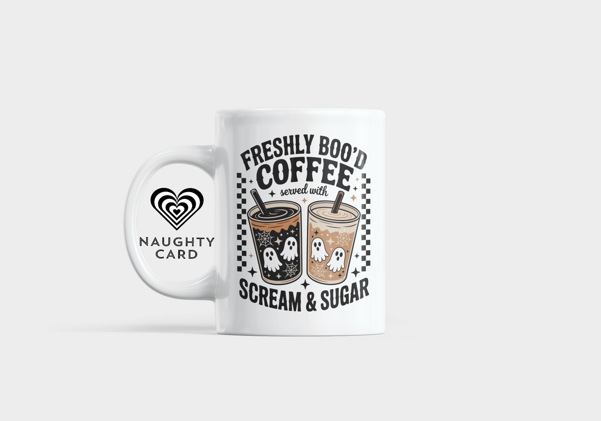 White mug with Halloween-themed coffee design and text on a white background