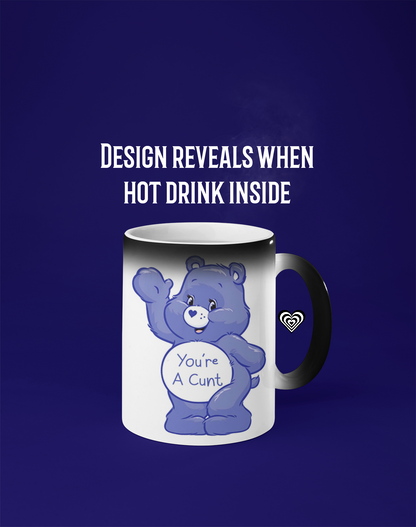 Mug with a cartoon bear design on a dark blue background