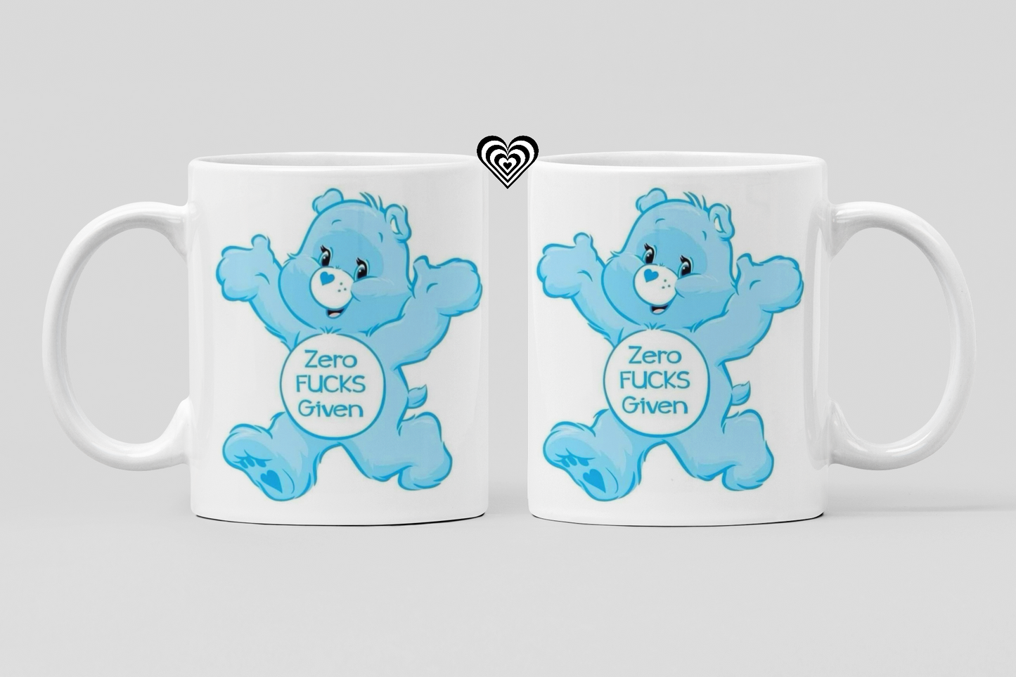 Two mugs with a blue swear bear  character and 'fresh out of fu*ks' text on a white background