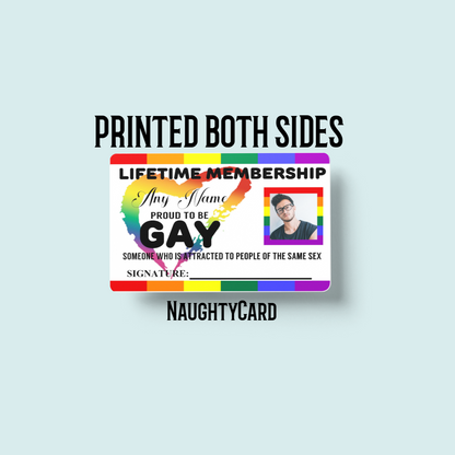 A colorful graphic design featuring a 'Lifetime Membership' card with the text 'Proud to be Gay' on it, also including a space for a photo which currently showcases a portrait. The design elements include a rainbow pride flag and decorative flowers in multiple colors.
