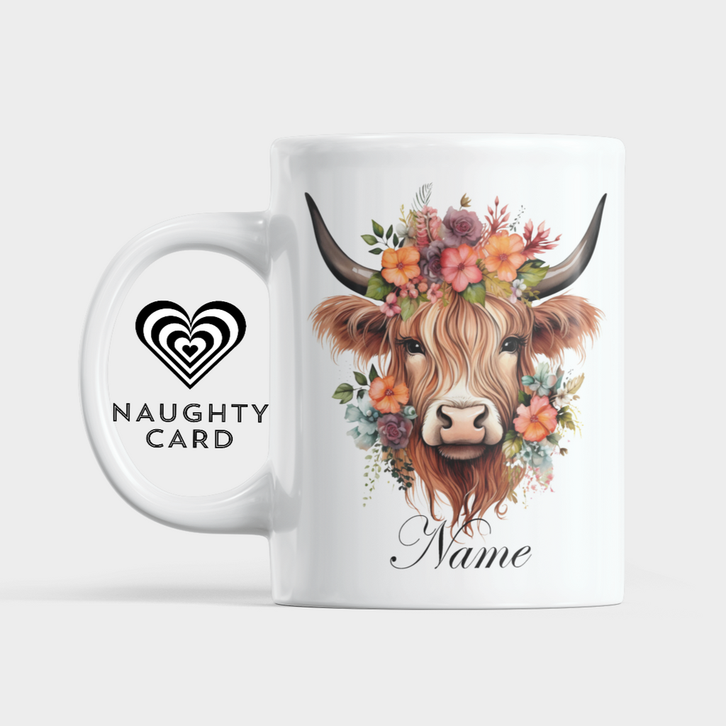 White mug with an image of a highland cow on a plain white background