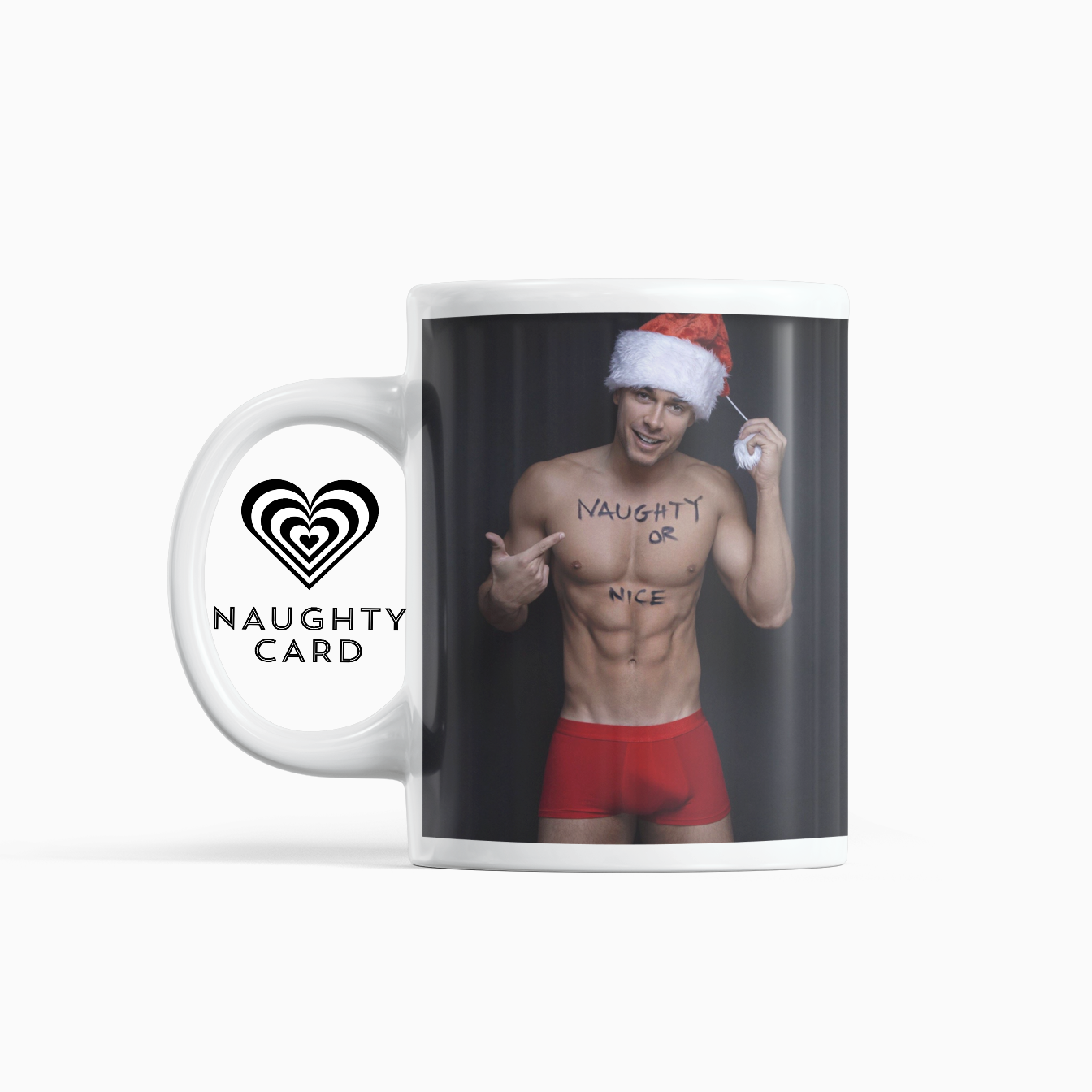 Man in red oxers wearing a christmas hat on a white mug