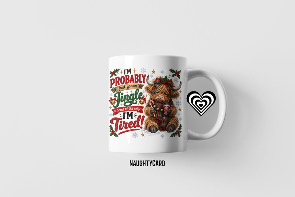 A white ceramic mug with a festive Christmas graphic featuring a fluffy Highland cow and the text 'I'm Probably Too Nasty For Jingle Country But I'm Tired For Christmas', shown on a light gray background with the brand name 'NAICHTYCARD' below.